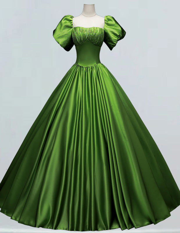 a green dress on a mannequin mannequin