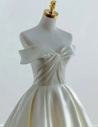 Elegant ivory satin off-shoulder bridal gown with pleats for girls' formal events, including prom and bridesmaid dresses0