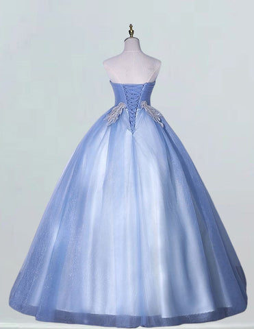 a light blue ball gown on a mannequin