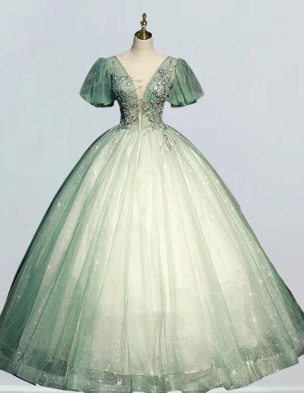 a green ball gown on a mannequin