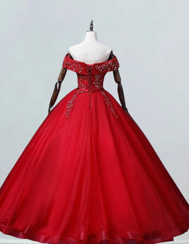 a red ball gown on a mannequin