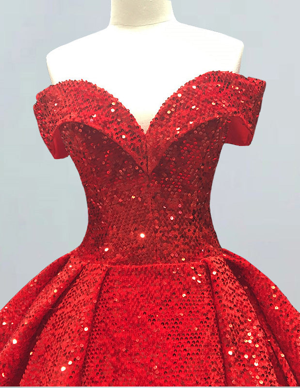 a red sequin dress on a mannequin