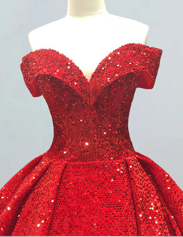 a red sequin dress on a mannequin