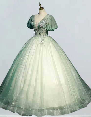 a green ball gown on a mannequin