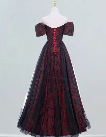 a red and black dress on a mannequin