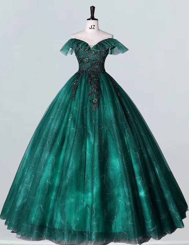 a green ball gown on a mannequin