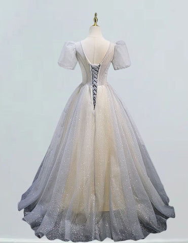 a dress on a mannequin on a white surface