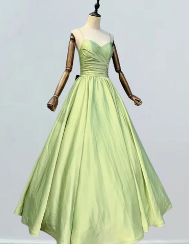 Elegant green pleated prom gown with spaghetti straps, perfect for formal events and evening parties1