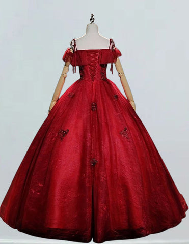 a red ball gown on a mannequin