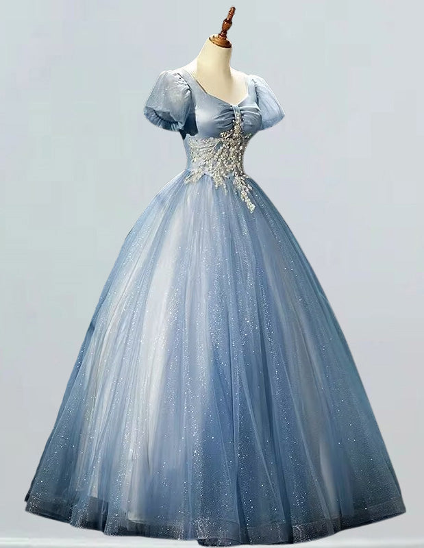 a blue ball gown on a mannequin