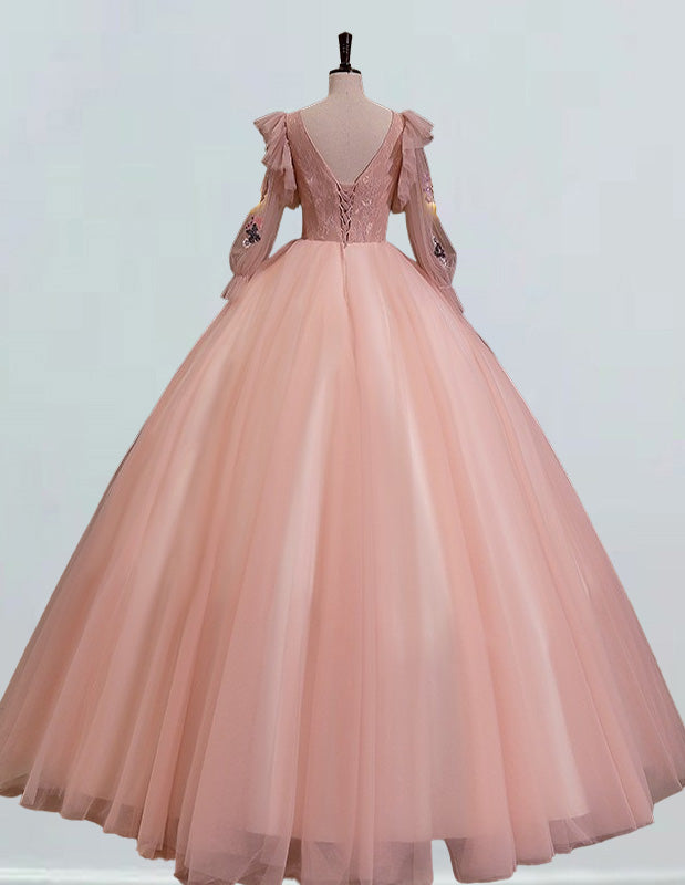 a pink ball gown on a mannequin