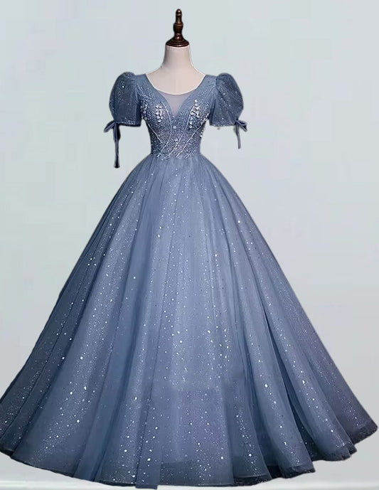 a blue ball gown on a mannequin VIMYES