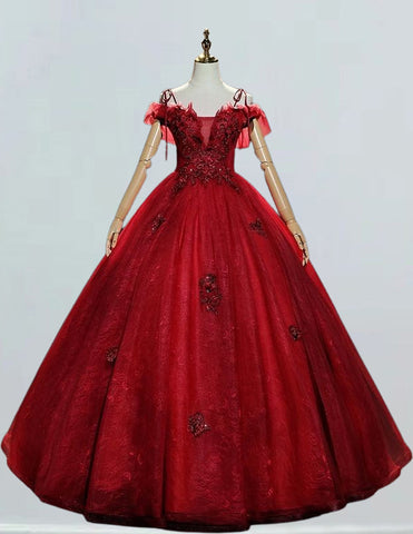 a red ball gown on a mannequin