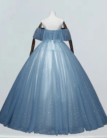 a blue ball gown with white stars on it