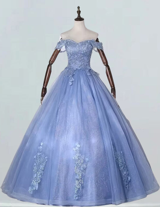 a blue ball gown on a mannequin VIMYES