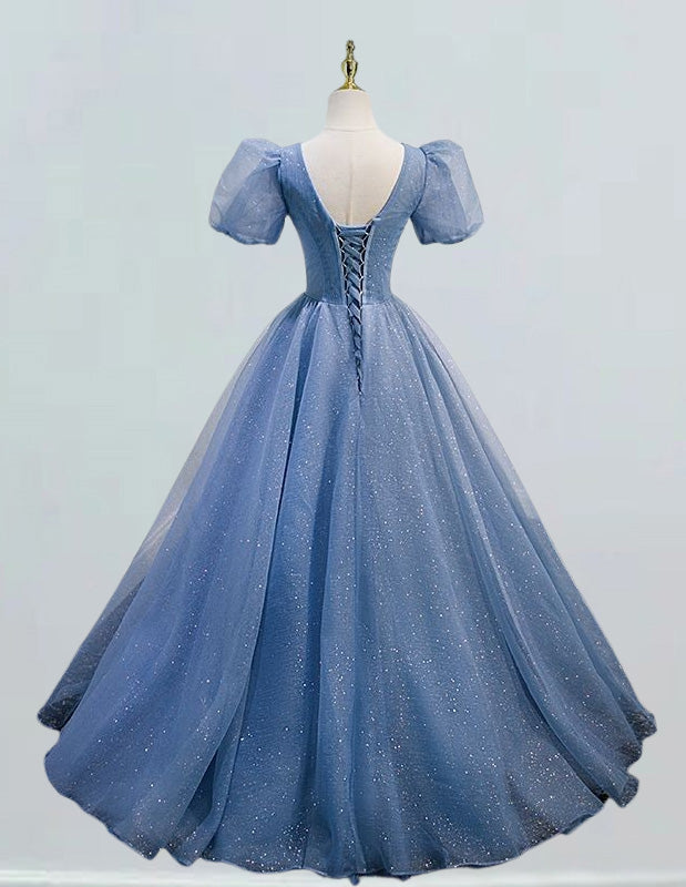a blue ball gown on a mannequin