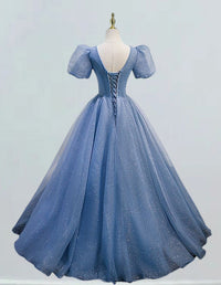 a blue ball gown on a mannequin