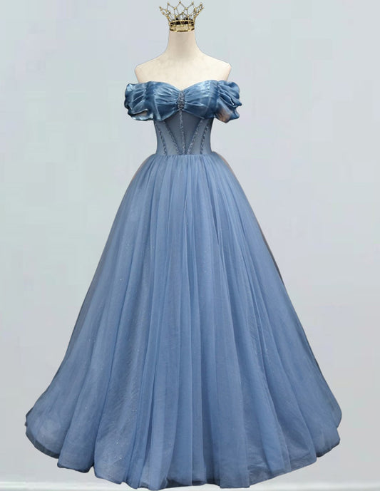 a dress on a mannequin with a crown on top of it