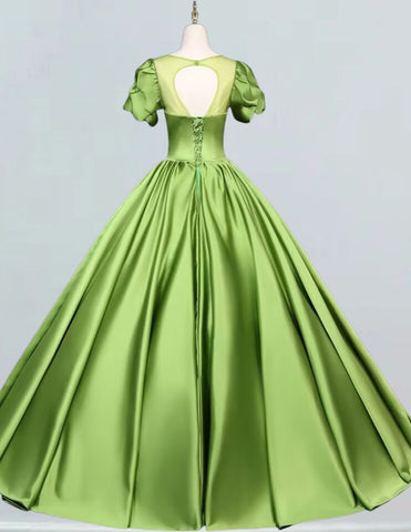 a green dress on a mannequin on a mannequin