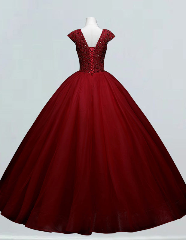 a red ball gown on a mannequin