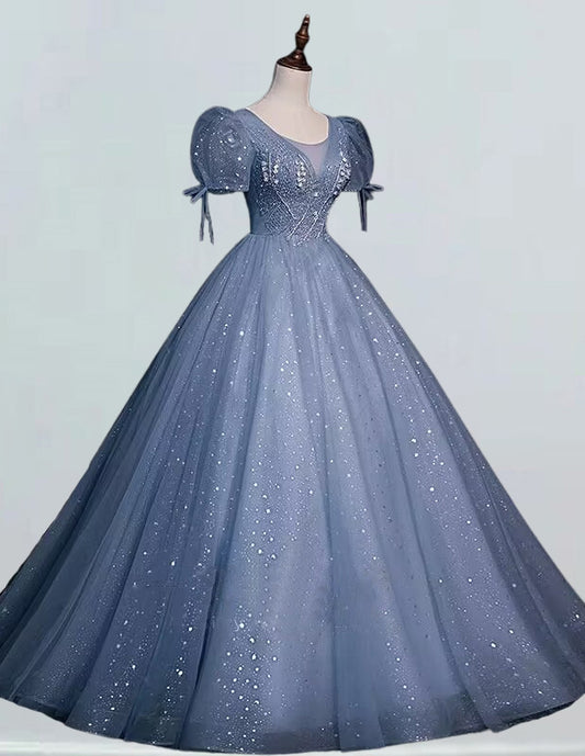 a blue ball gown on a mannequin VIMYES