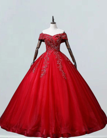 a red ball gown on a mannequin