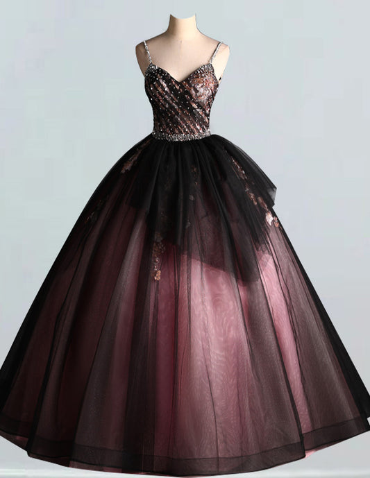 a black and pink dress on a mannequin