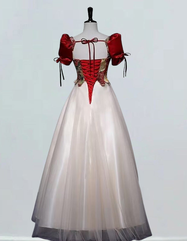 a white and red dress on a mannequin