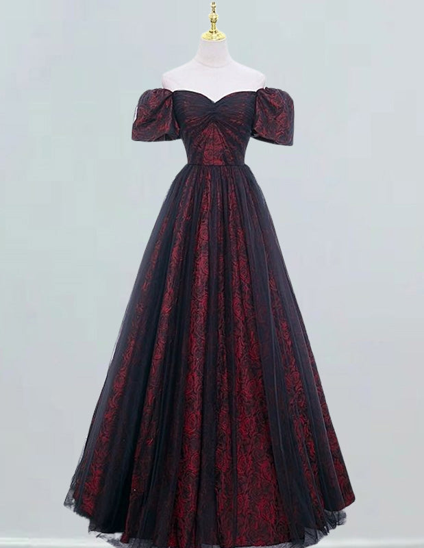 a black and red dress on a mannequin