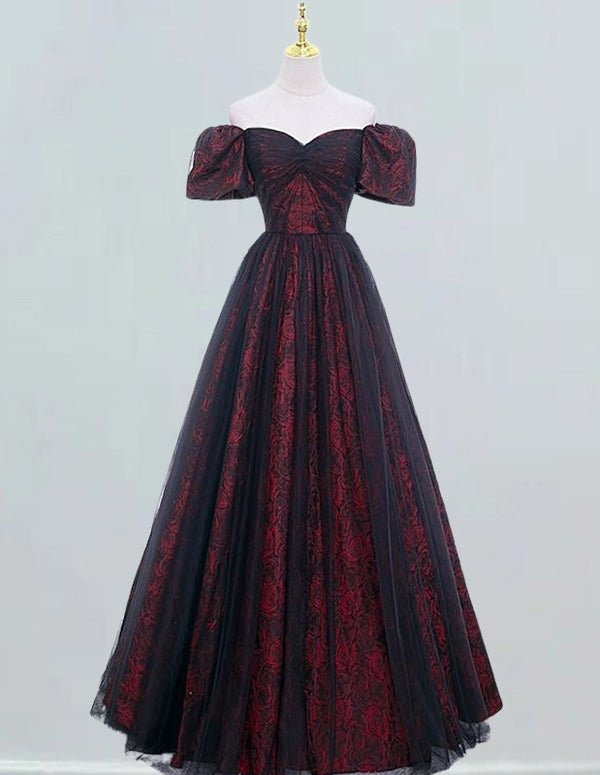 a black and red dress on a mannequin