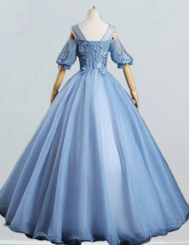 Elegant blue tulle Quinceanera dress with lace applique and sleeves for girls' formal events, including prom and bridesmaid occasions0