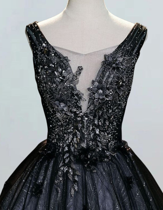 a black dress on a mannequin headdress