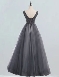 Gray V-neck tulle prom dress with crystal beading and lace-up back