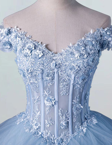 a blue ball gown with flowers on it