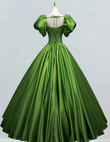 a green dress on a mannequin mannequin