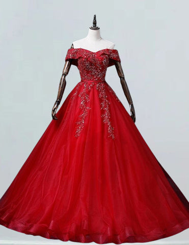 a red ball gown on a mannequin