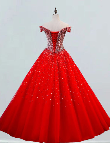 a red ball gown on a mannequin