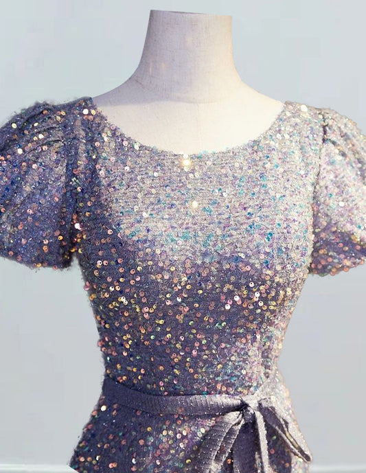 a dress on a mannequin with sequins on it