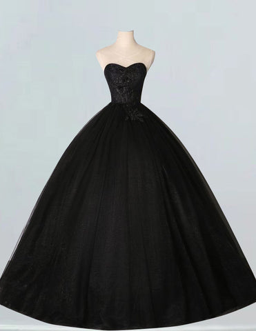 a black ball gown on a mannequin