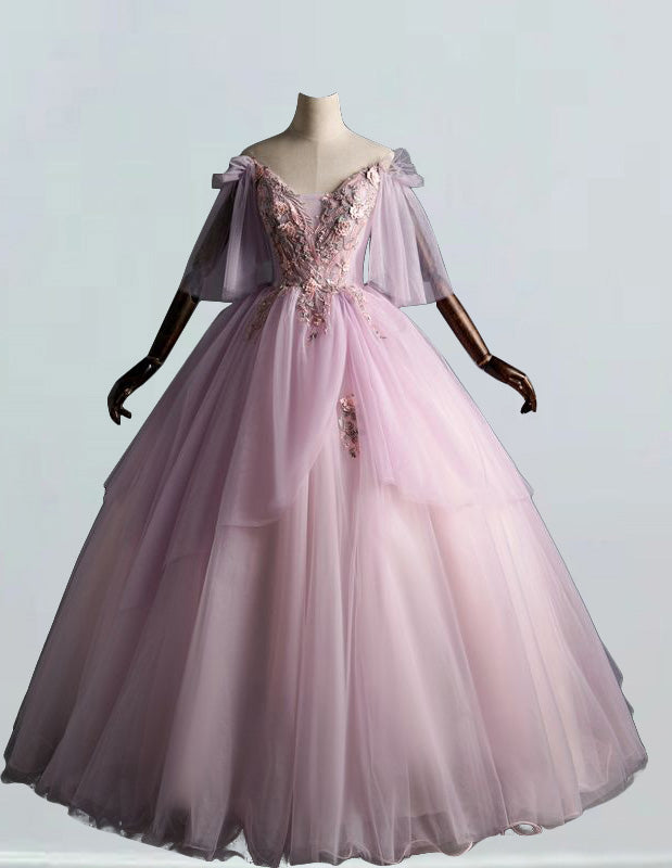 a pink ball gown on a mannequin