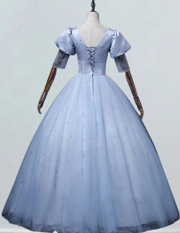 a blue ball gown on a mannequin